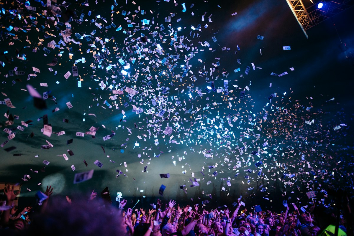 Concert stage lights and crowd cheering